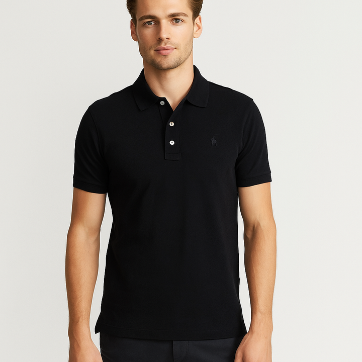 Man wearing a black polo shirt with a brand logo on a light gray background